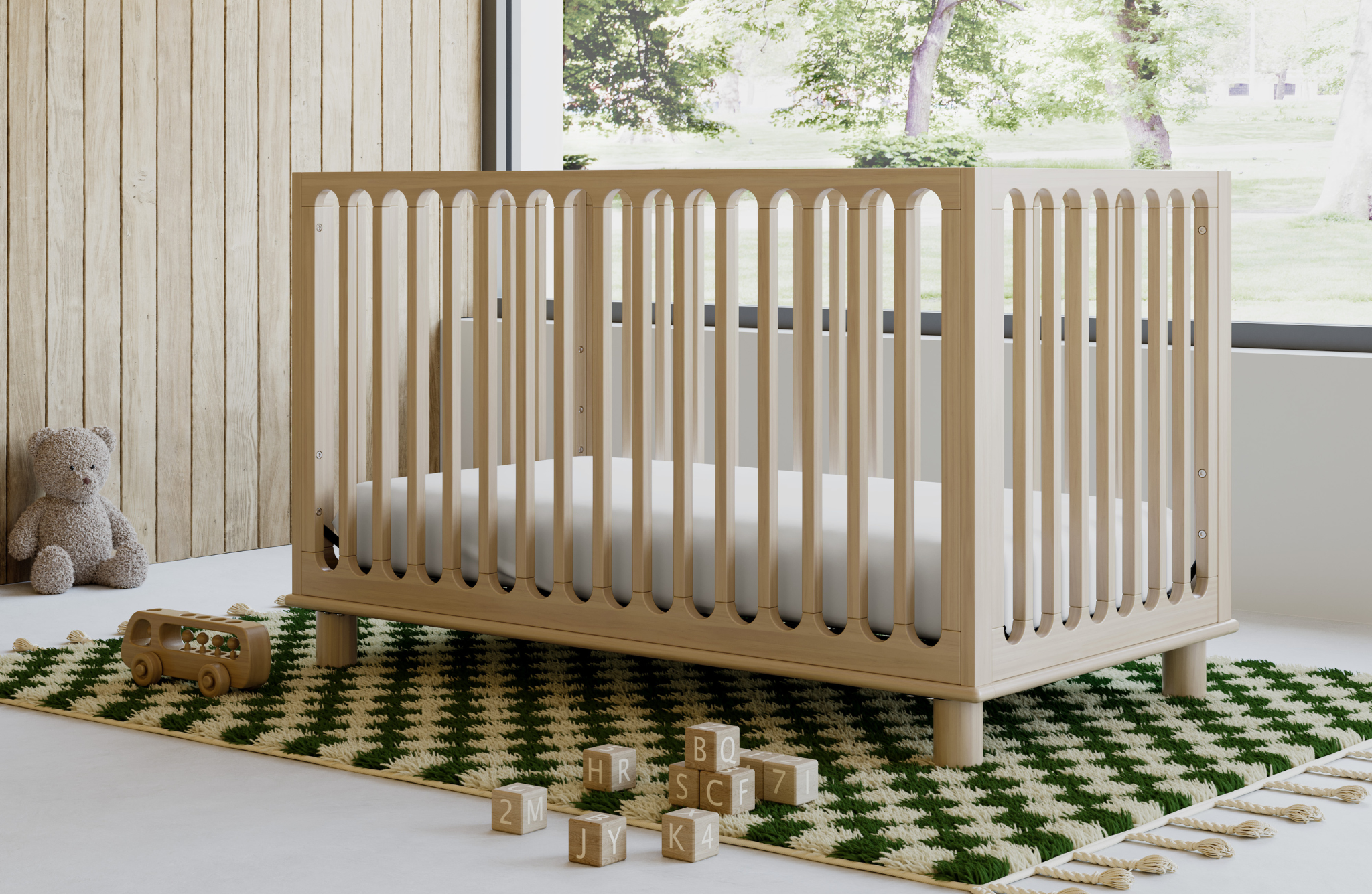 Natural wood baby crib in a nursery room