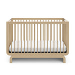 Storkcraft® Santorini® Deluxe 5-in-1 Convertible Crib with Bonus Toddler Guardrail.