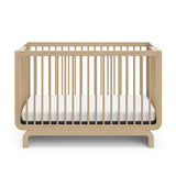 Storkcraft® Santorini® Deluxe 5-in-1 Convertible Crib with Bonus Toddler Guardrail.
