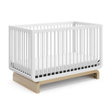 Storkcraft® Santorini® Deluxe 5-in-1 Convertible Crib with Bonus Toddler Guardrail.