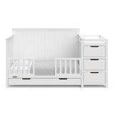 Hadley white crib and changer converted to toddler bed with two guardrails
