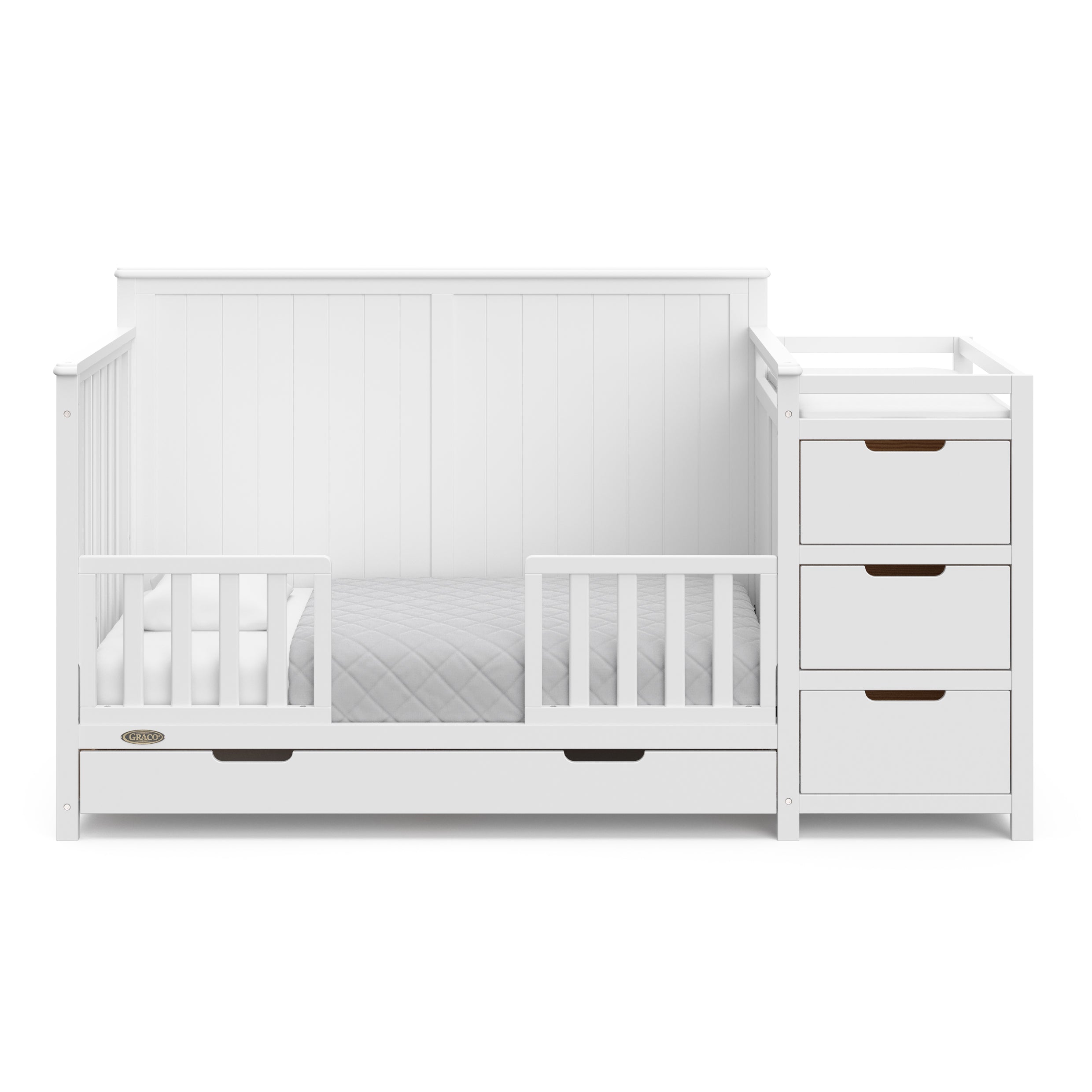 Hadley white crib and changer converted to toddler bed with two guardrails
