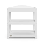 Front view of white changing table with removable headboard and two open shelves