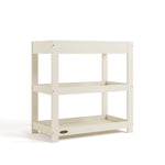Graco frosted oat customizable changing table with flat headboard angle view