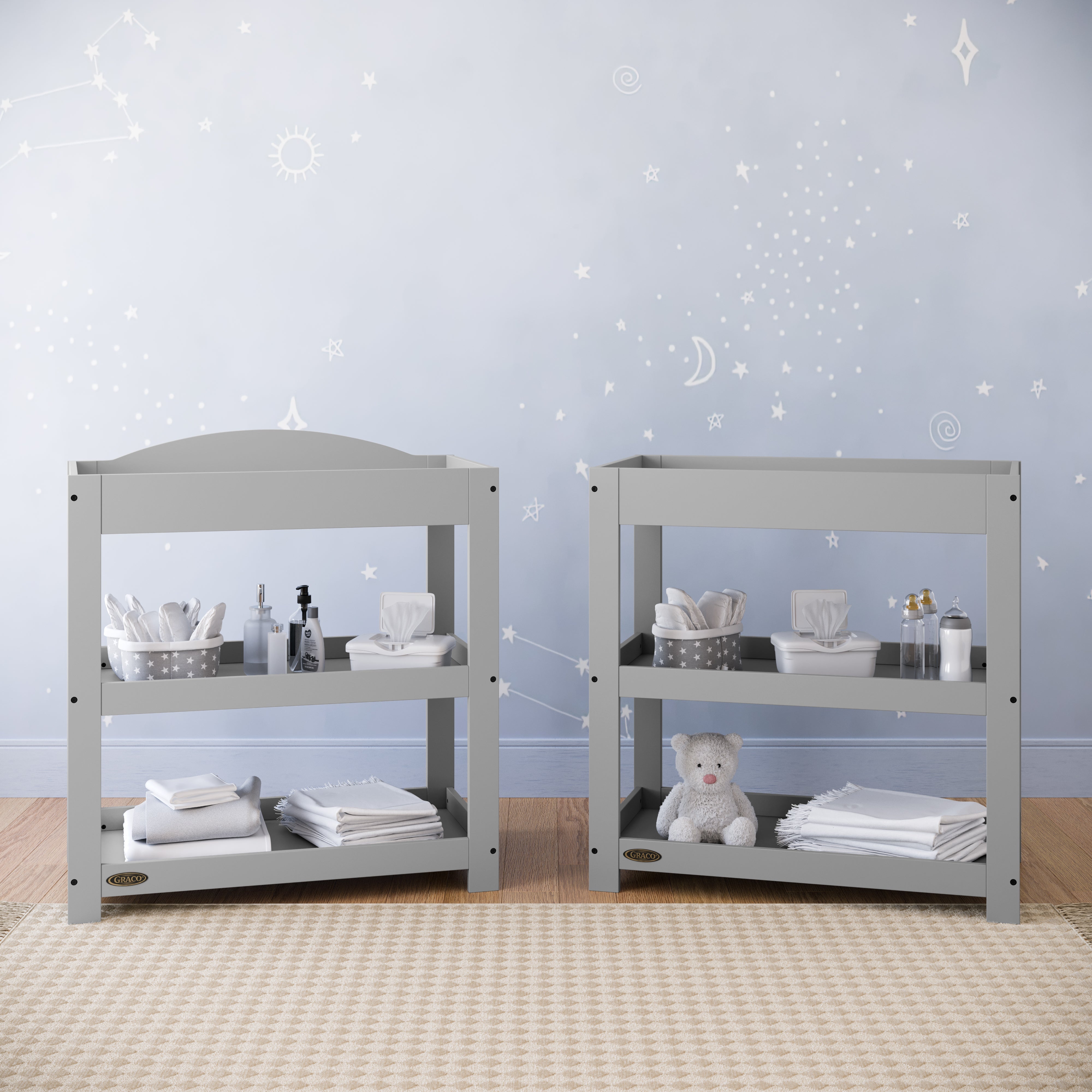Pebble gray changing table with removable headboard and two open shelves in nursery