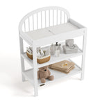 Olivia white changing table top view with baby items on shelves