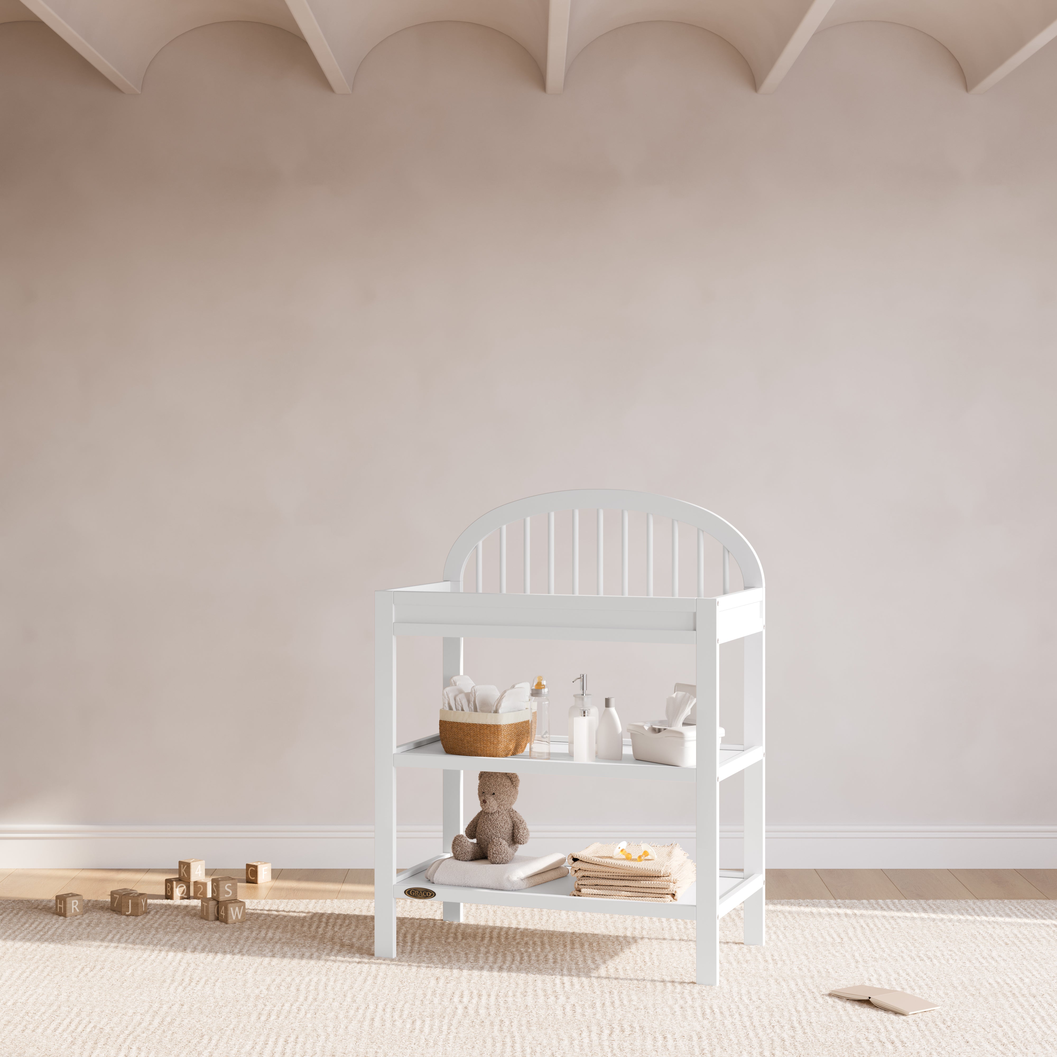 Olivia white changing table in a nursery