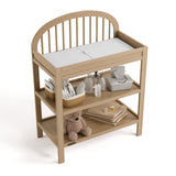 Olivia driftwood changing table top view with baby items on shelves