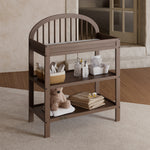 Olivia hazelnut changing table in a nursery