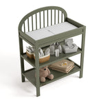 Olivia olive changing table top view with baby items on shelves