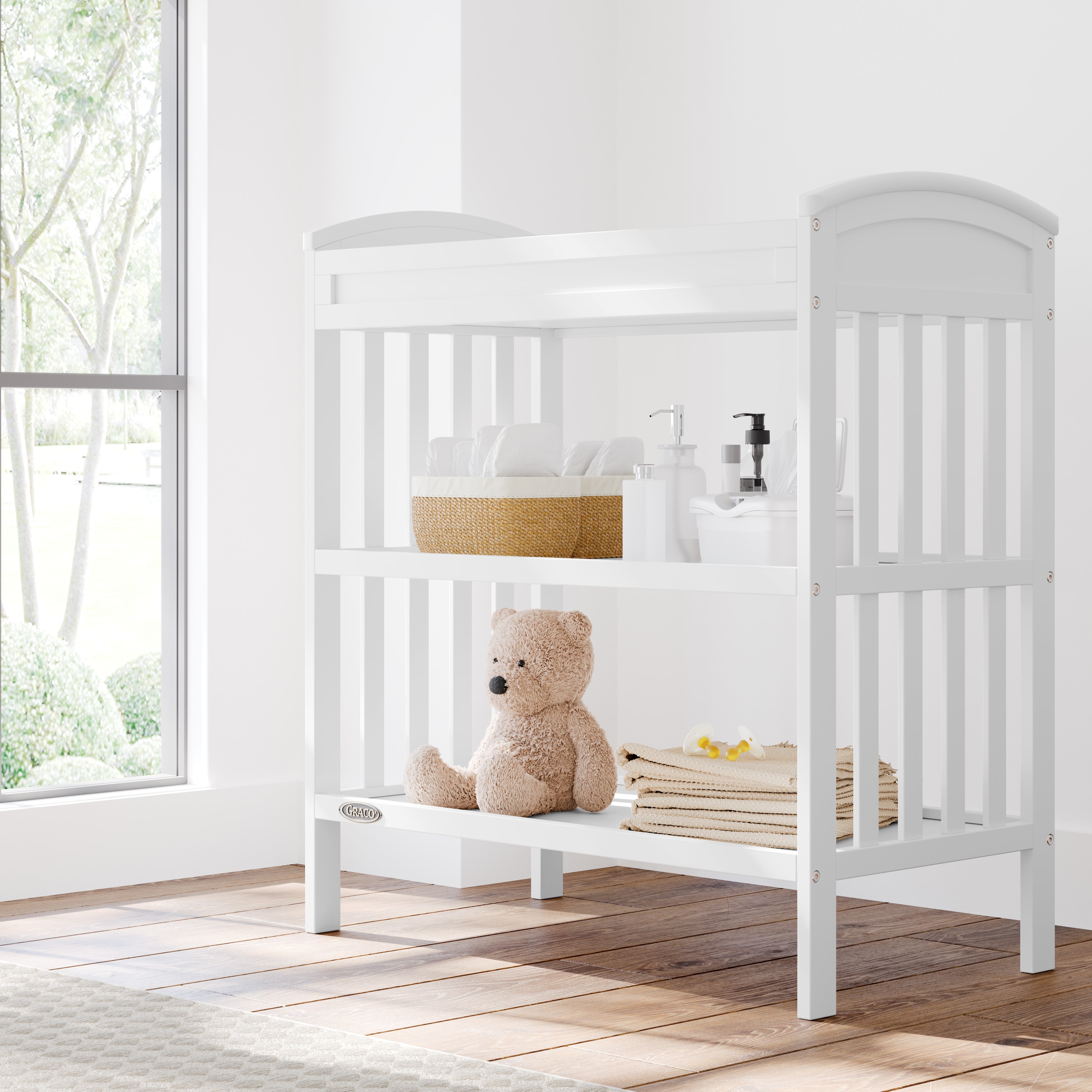 Graco® Benton Changing Table with Bonus Water-Resistant Changing Pad.
