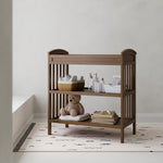 Benton hazelnut changing table in a nursery