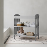 Benton pebble gray changing table in a nursery