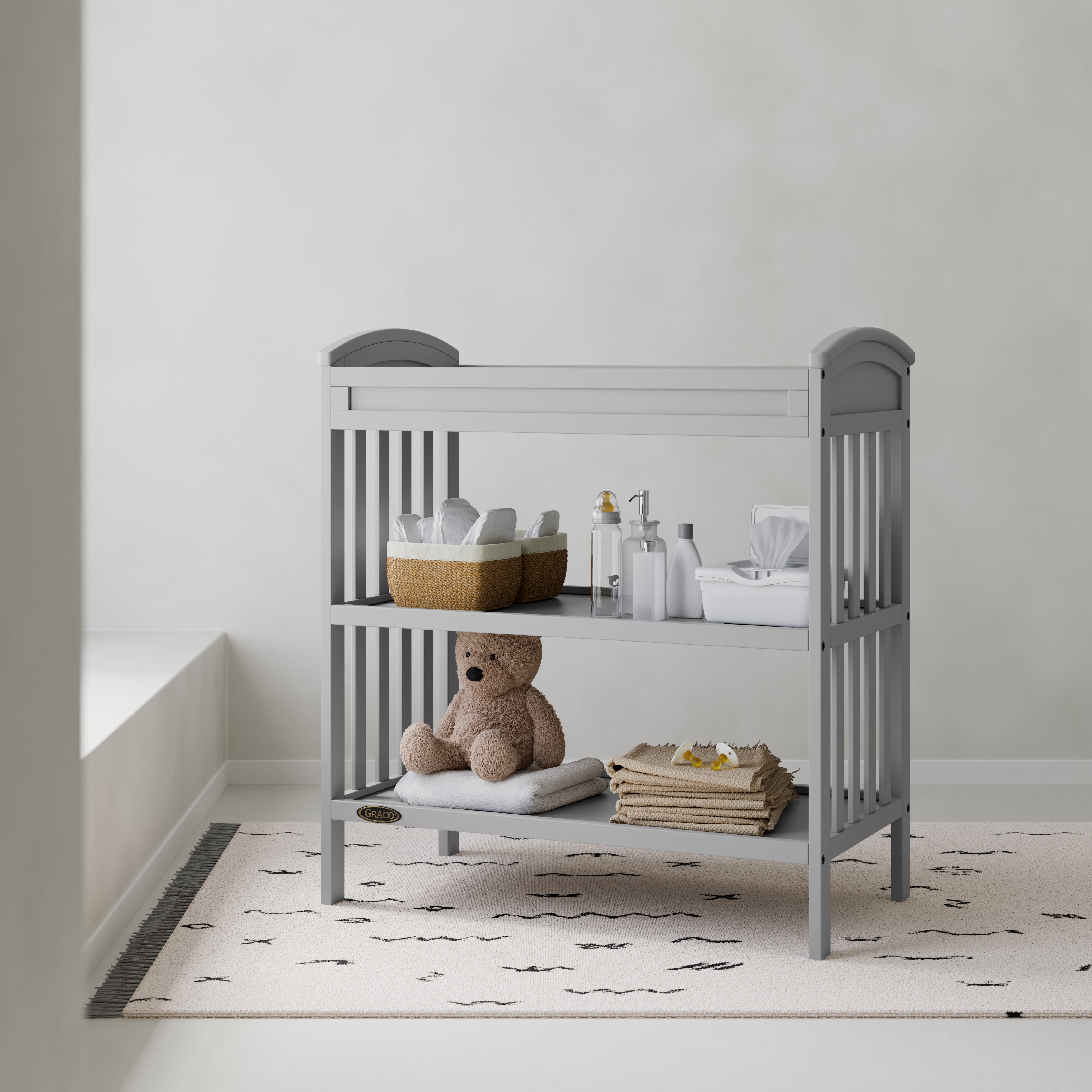 Benton pebble gray changing table in a nursery