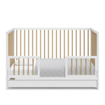 White with driftwood Toddler Safety Guardrail Kit with dowels applied in toddler bed