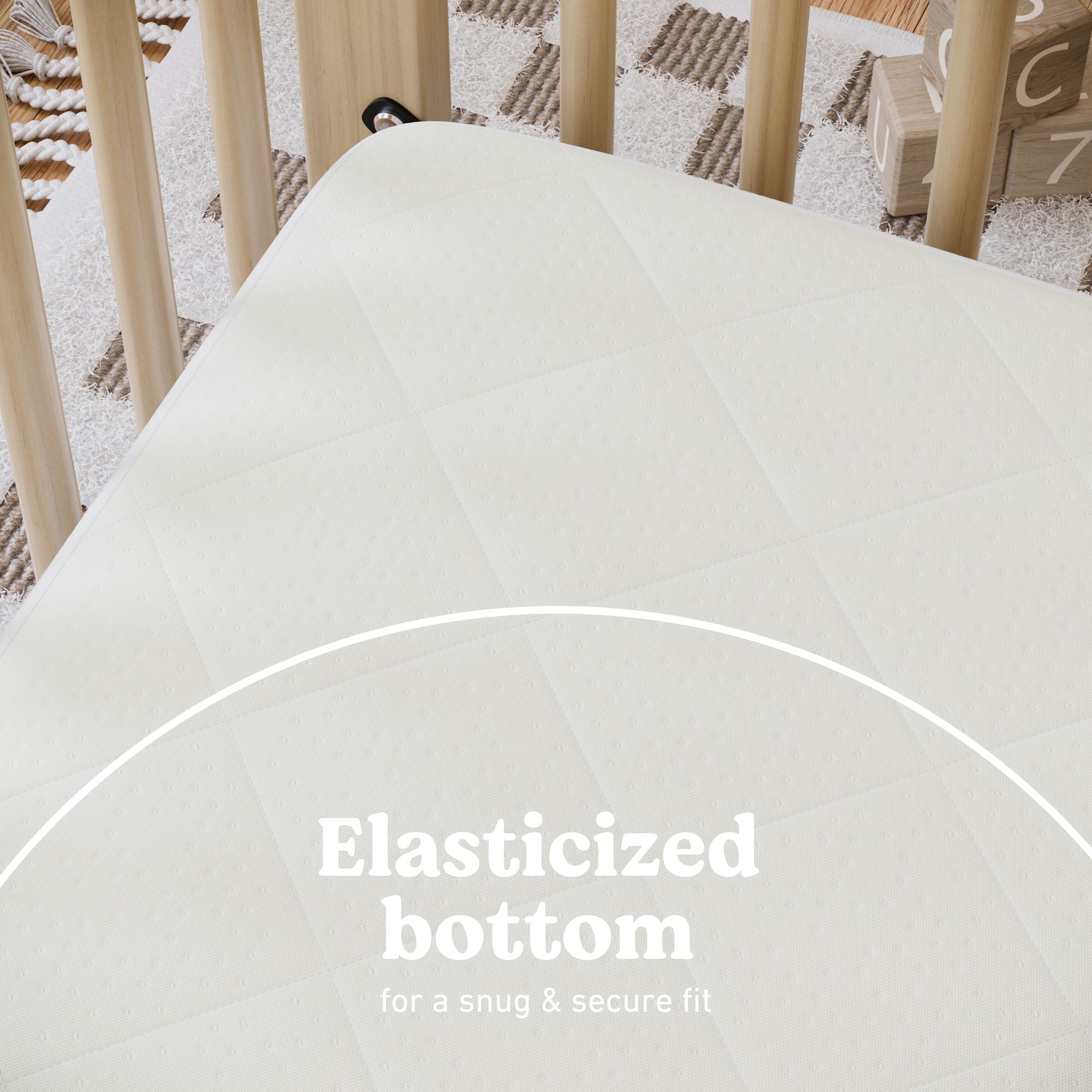 graco premium crib and toddler mattress protector elasticized bottom callout