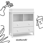 alpine white 2 drawer changing chest with black cartoon drawings overlaid on image