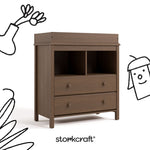 alpine hazelnut 2 drawer changing chest with black cartoon drawings overlaid on image
