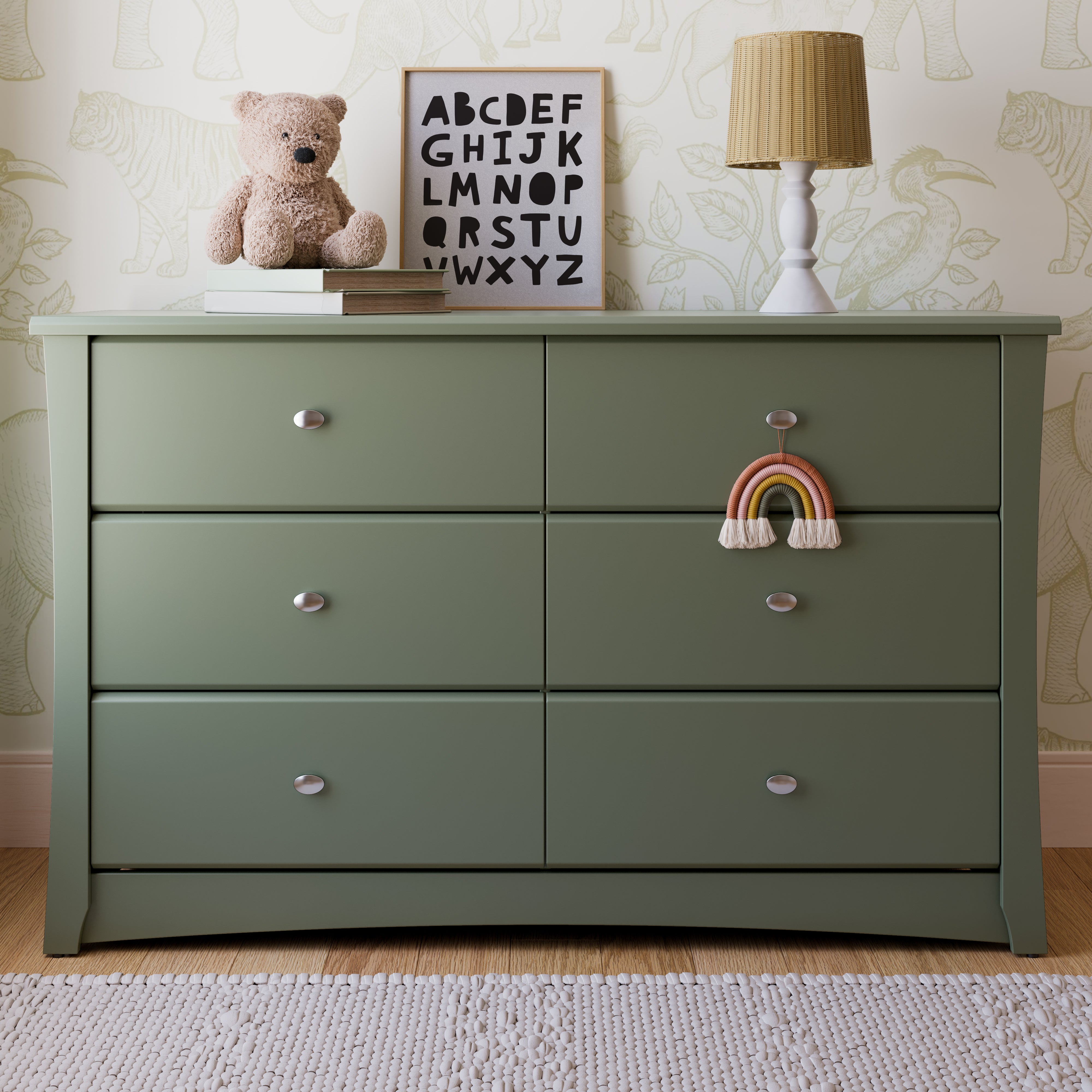 Crescent olive 6 drawer dresser in a nursery