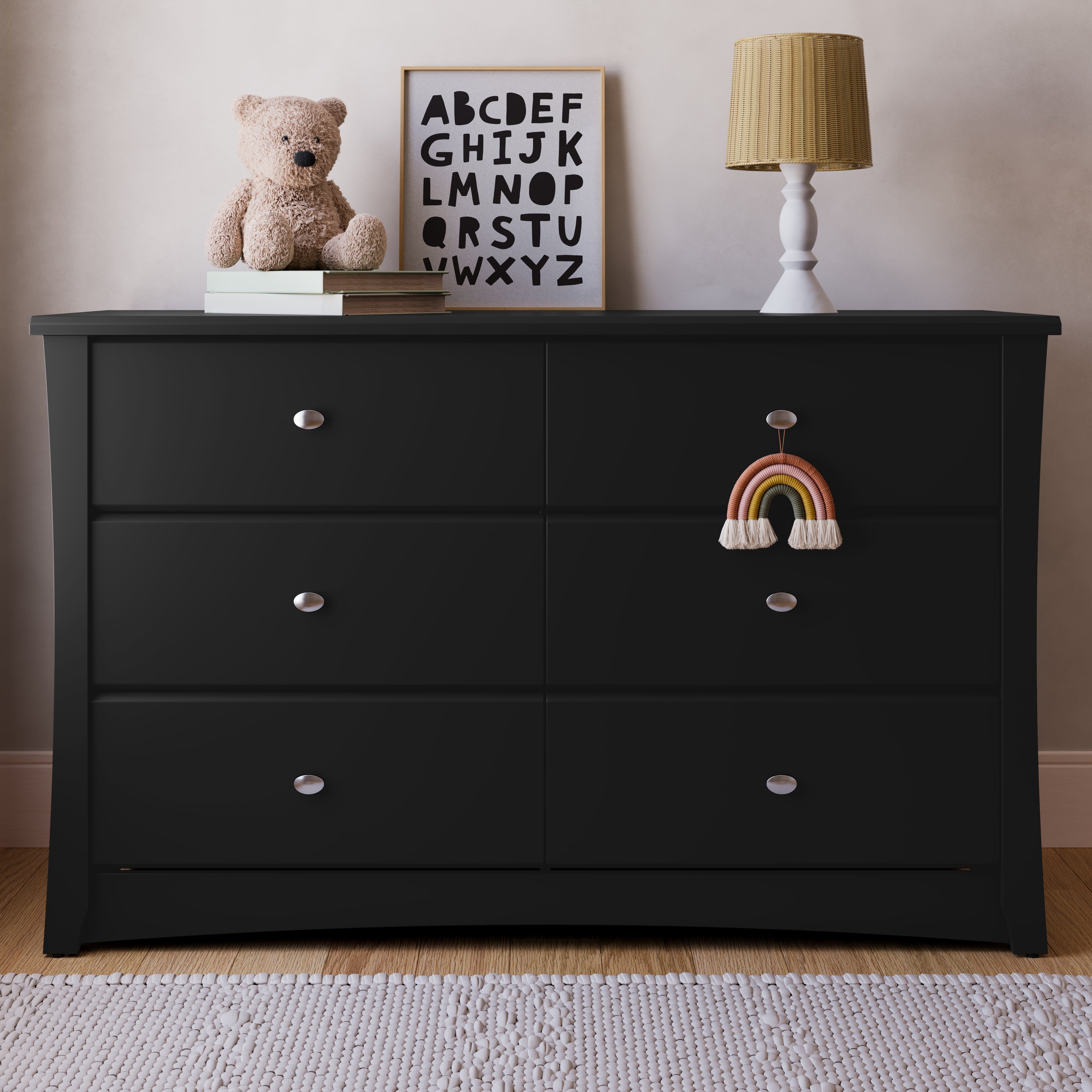 Crescent black 6 drawer dresser in a nursery