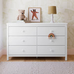 Alpine white 6 drawer dresser in a nursery