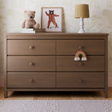 Alpine hazelnut 6 drawer dresser in a nursery
