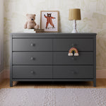 Alpine gray 6 drawer dresser in a nursery