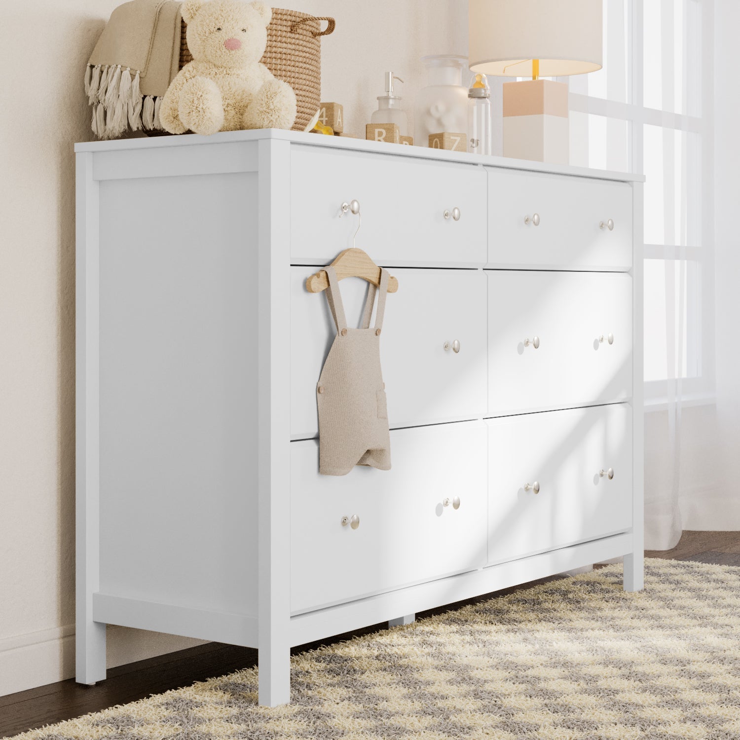 white dresser in nursery
