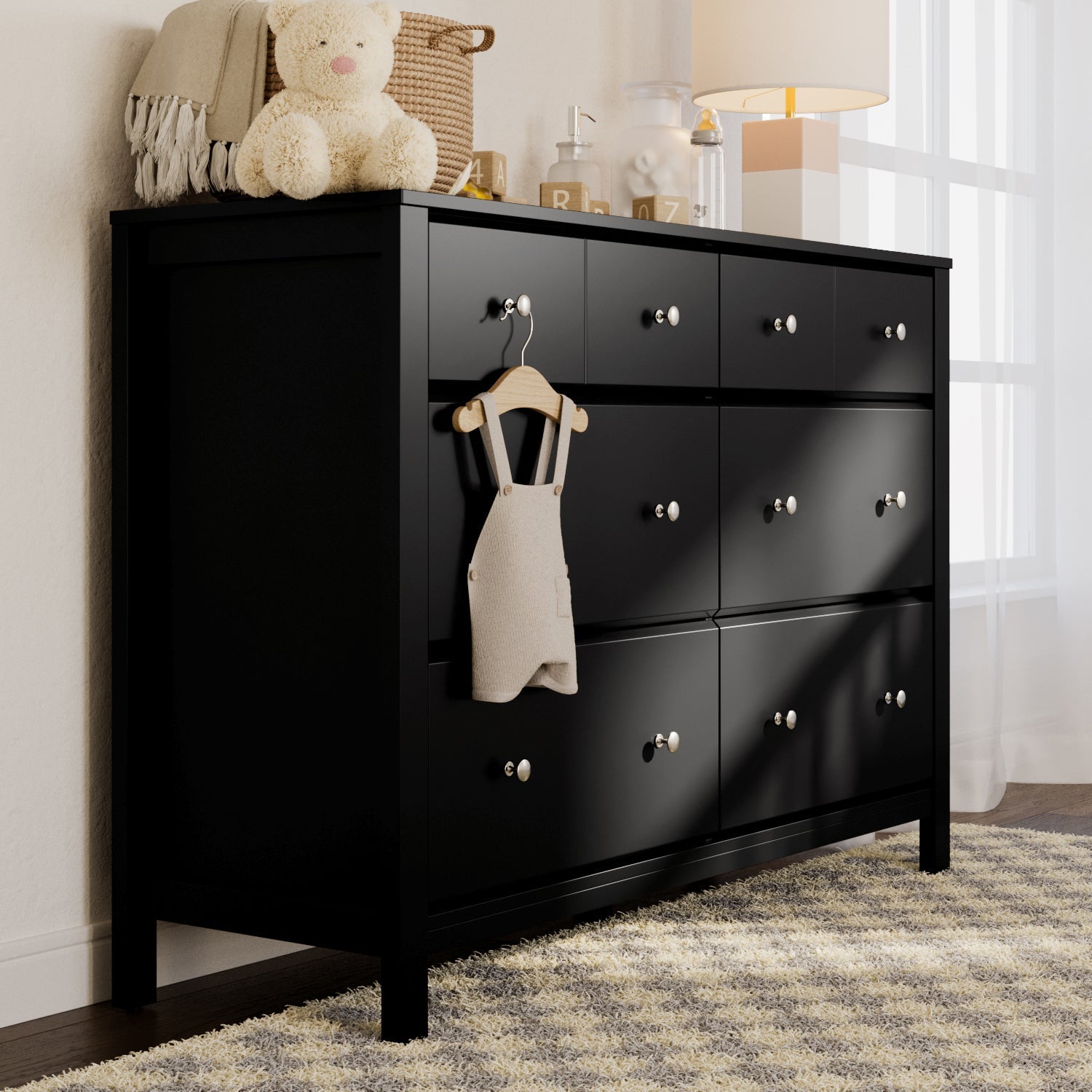 black dresser in nursey