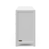 Teddi white 6 drawer dresser with white knobs side view