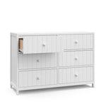 Teddi white 6 drawer dresser with white knobs and top left drawer open angle view
