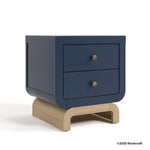 Santorini midnight blue with driftwood 2 drawer nightstand with 2025 Storkcraft copyright on bottom right
