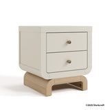 Santorini frosted oat with driftwood 2 drawer nightstand with 2025 Storkcraft copyright on bottom right