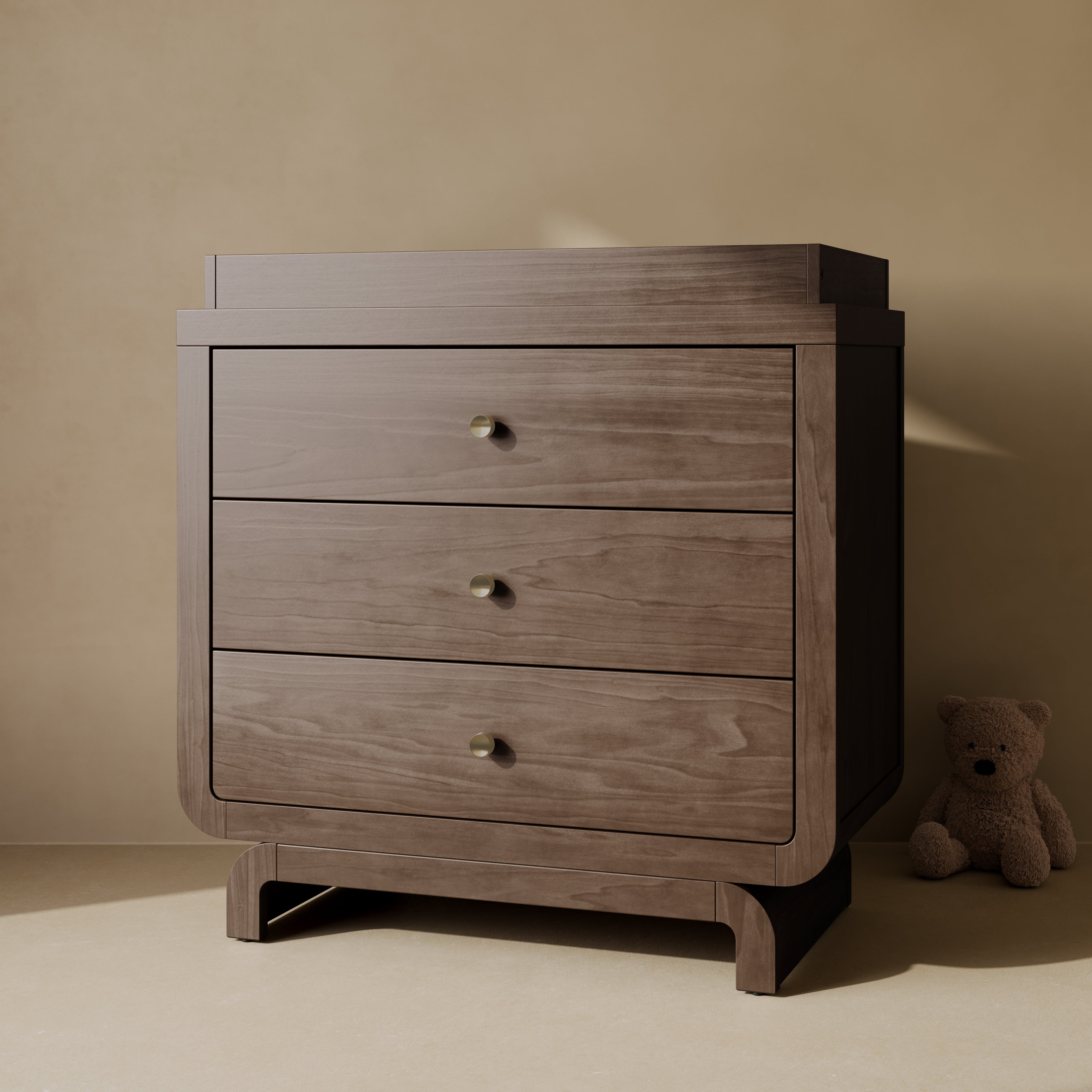 Santorini hazelnut 3 drawer chest with changing topper in a nursery