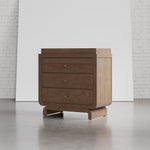 Santorini hazelnut 3 drawer chest with changing topper in a nursery