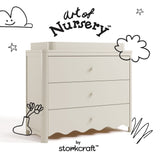 Casablanca frosted oat 3 drawer chest with changing topper with black doodles overlaid on image