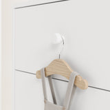 Close up view of white dresser