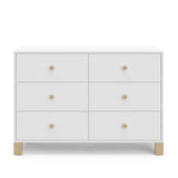 Front view of white dresser with driftwood knobs and base