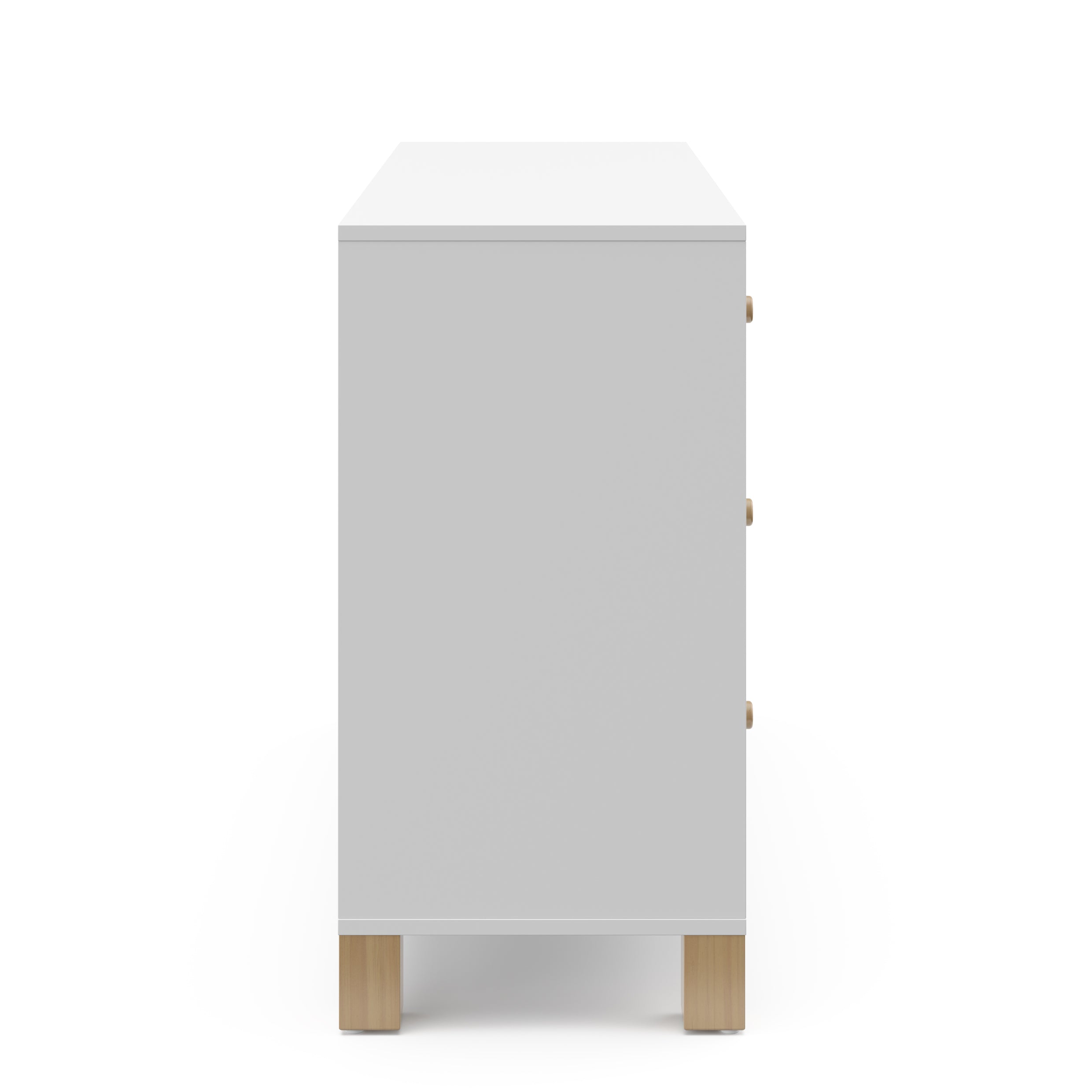 side view of white dresser with driftwood knobs and base