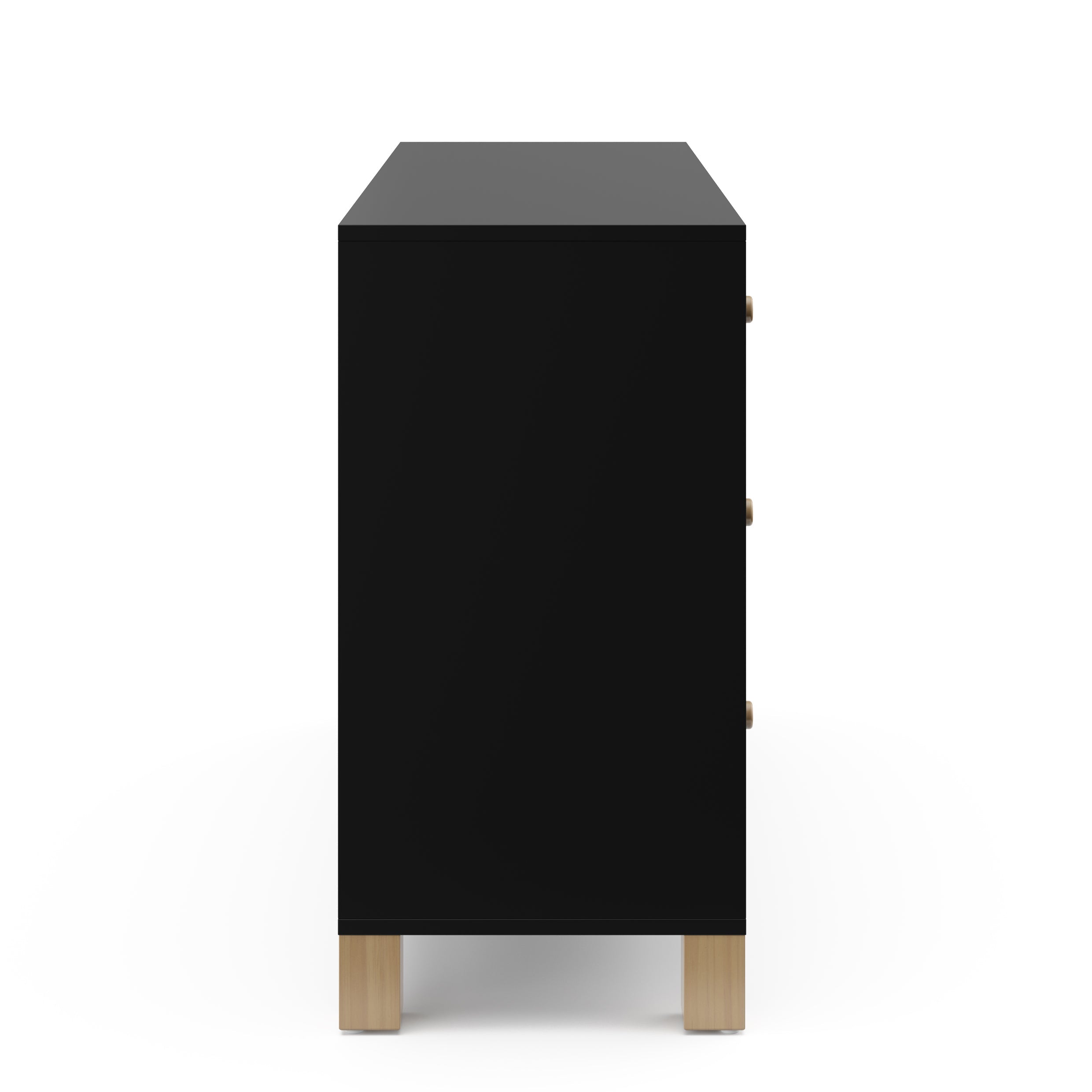 Side view of black dresser with driftwood knobs and base