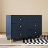 California midnight blue with driftwood 6 drawer dresser in a nursery