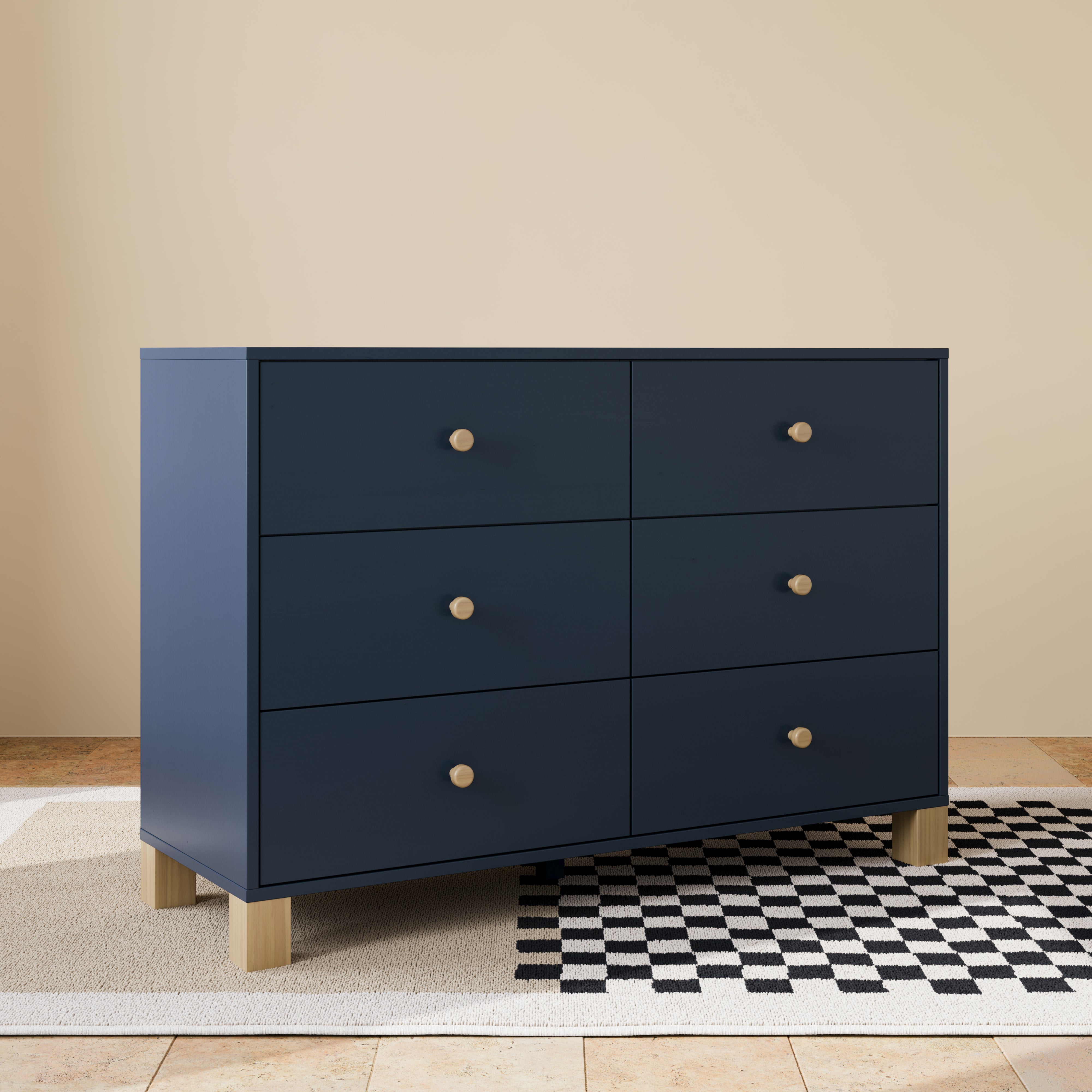 California midnight blue with driftwood 6 drawer dresser in a nursery