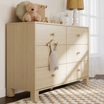 California driftwood 6 drawer dresser in a nursery