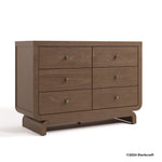 Santorini hazelnut 6 drawer dresser with 2024 Storkcraft copyright on bottom right