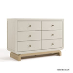 Santorini frosted oat with driftwood 6 drawer dresser with 2024 Storkcraft copyright on bottom right