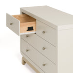 Santorini frosted oat with driftwood 6 drawer dresser with top left drawer open side view showing interlocking drawer mechanism