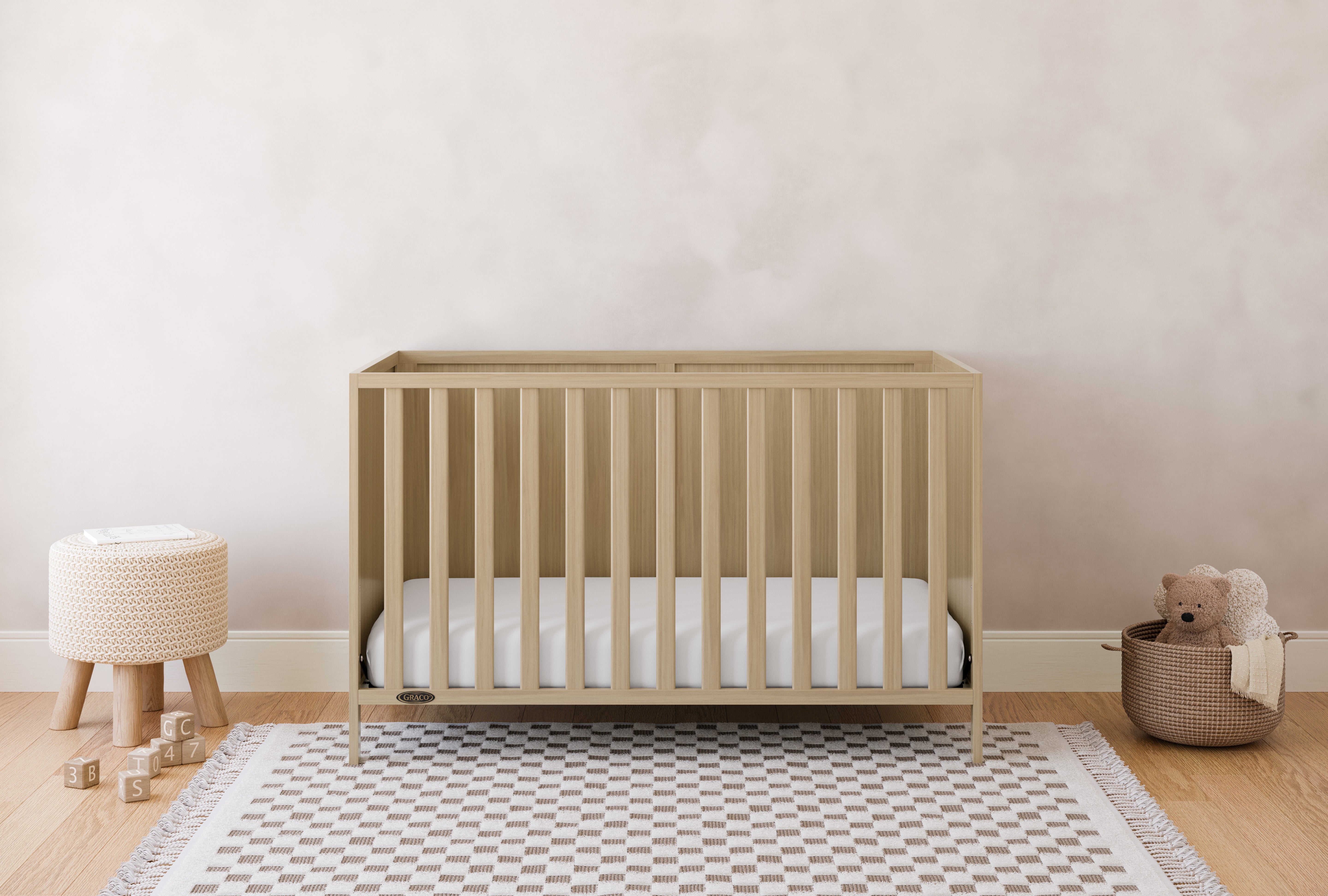 Theo driftwood crib in a nursery