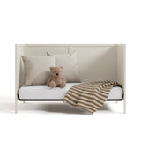 Theo frosted oat crib converted to daybed