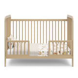 Driftwood Toddler Safety Guardrail Kit with dowels applied in toddler bed