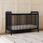 black crib in nursery